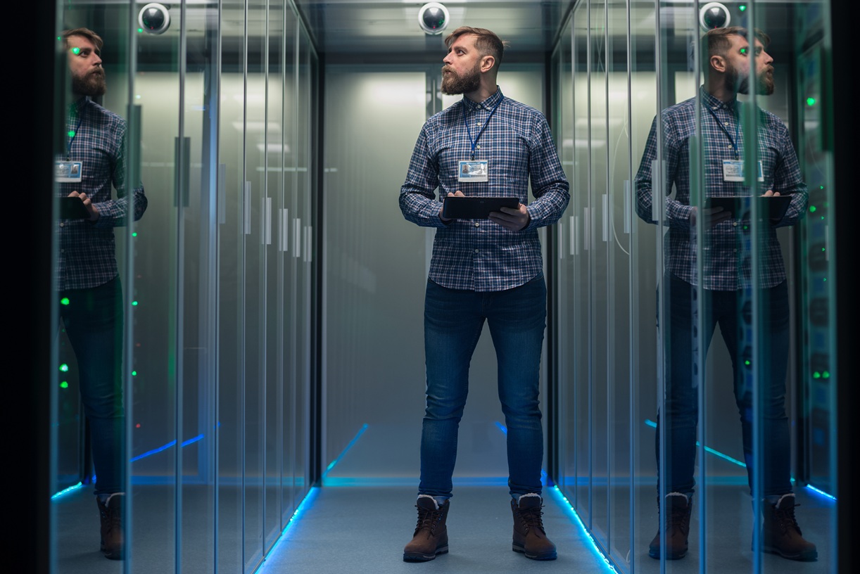Adult IT engineers in server room kaufmann